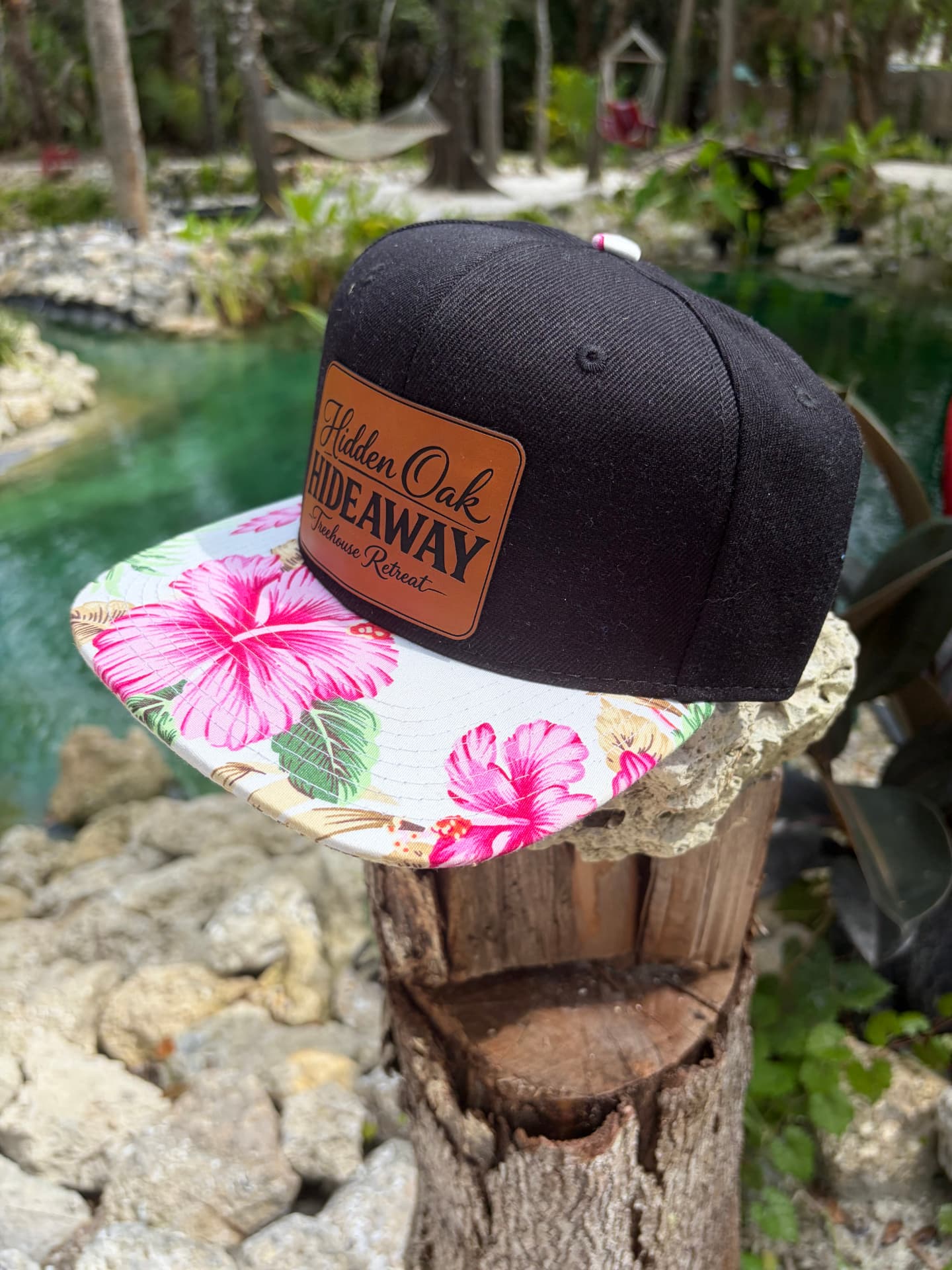 Black Hidden Oak Hideaway snapback with pink hibiscus brim