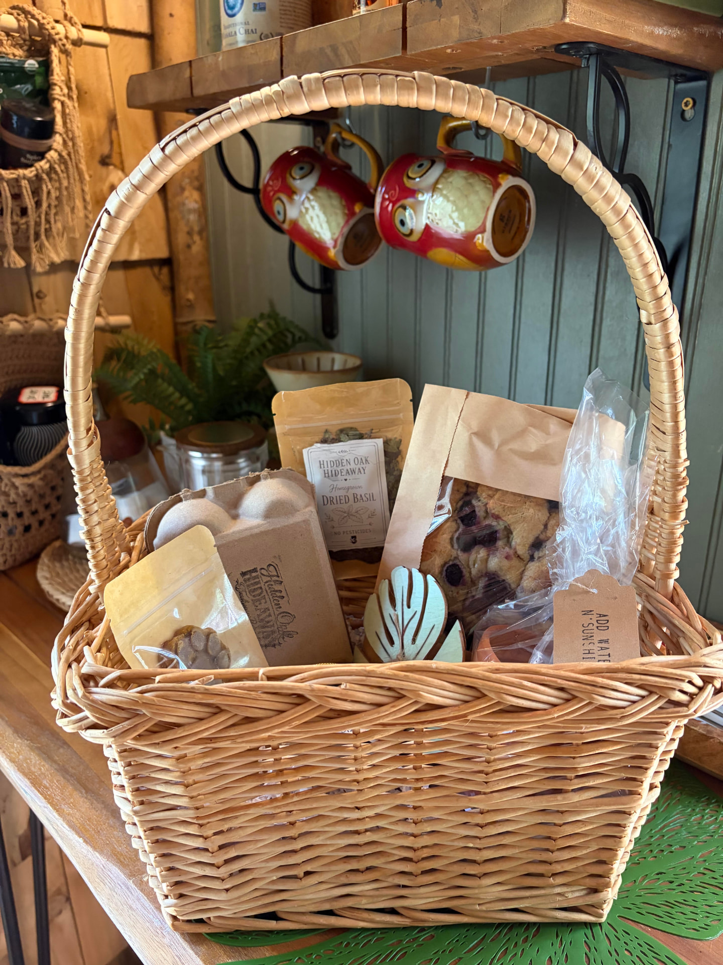 A basket of organic baked goods and locally made products from the Farm Stand